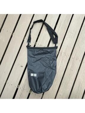 Uniqlo Dry Bag in Black with removable multi position adjustable strap